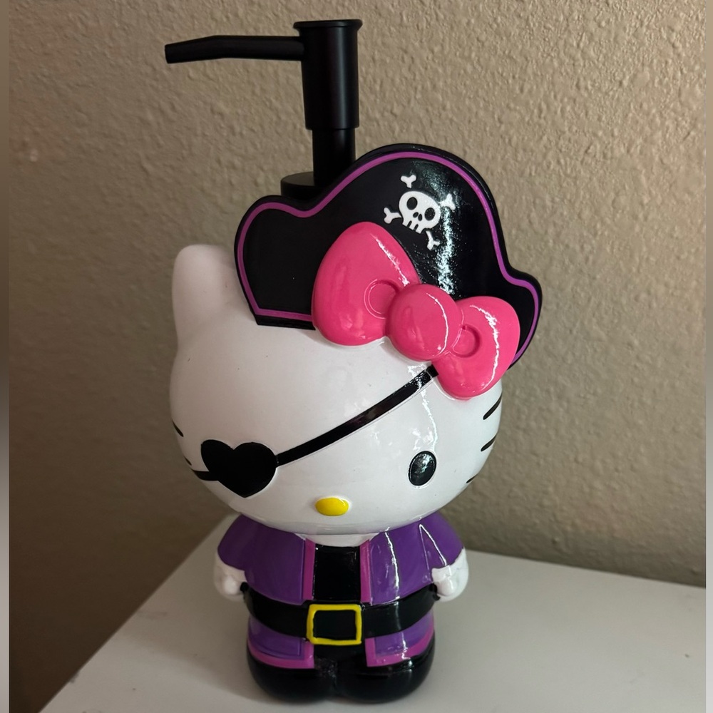 hello Kitty pink and purple pirate dispenser